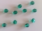 Кристаллы  зеленого цвета, прозрачные. Размер: 4 мм. 50 гр 